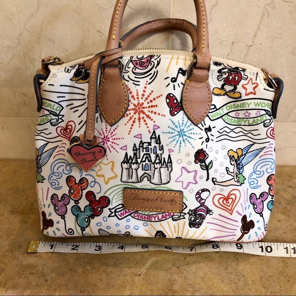 Dooney & Burke Disney sketch design bag.